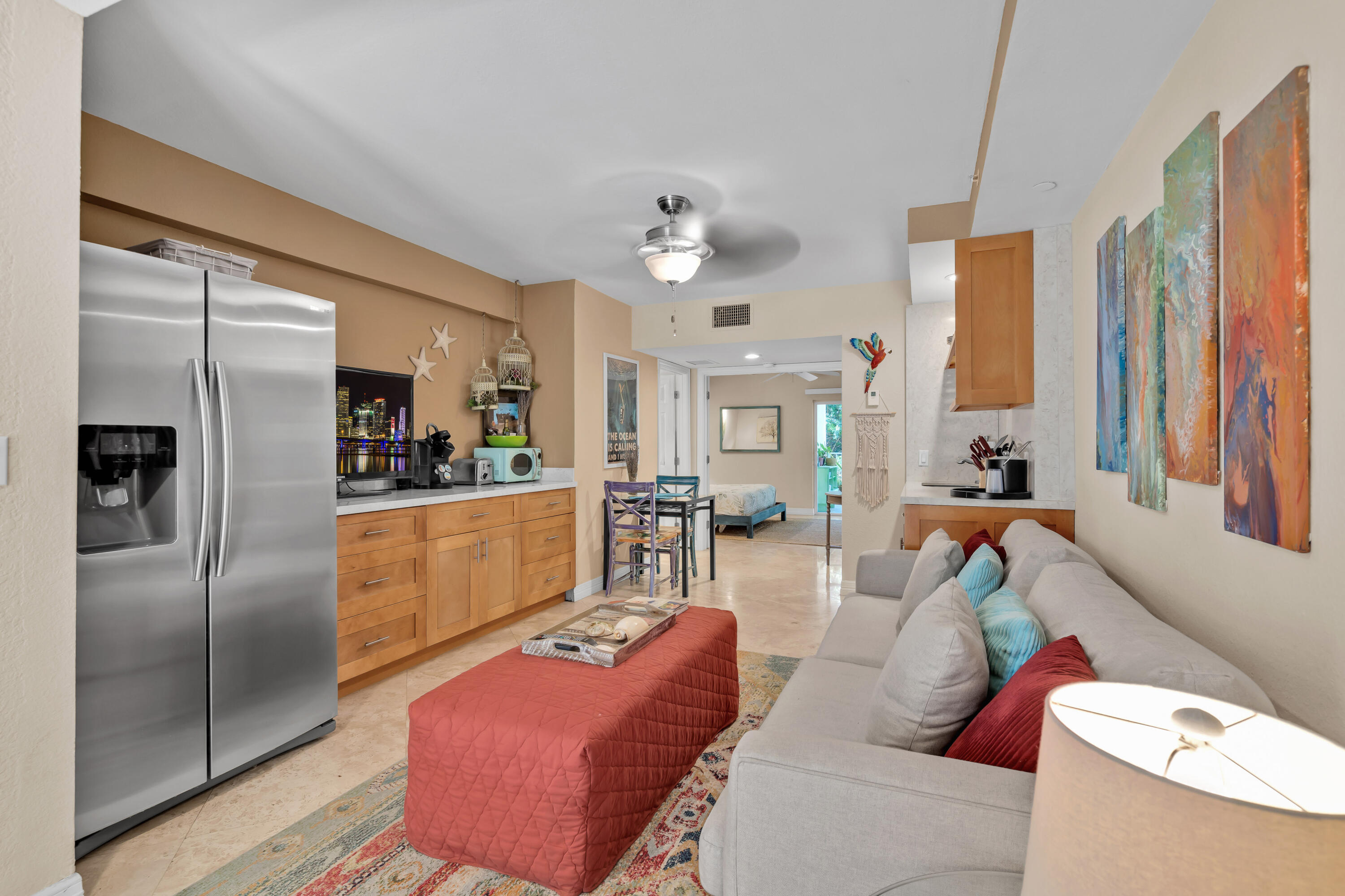 97501 Overseas Highway, Unit 607 Key Largo, FL 33037 - Photo 18 of 73 a living room with furniture and a kitchen
