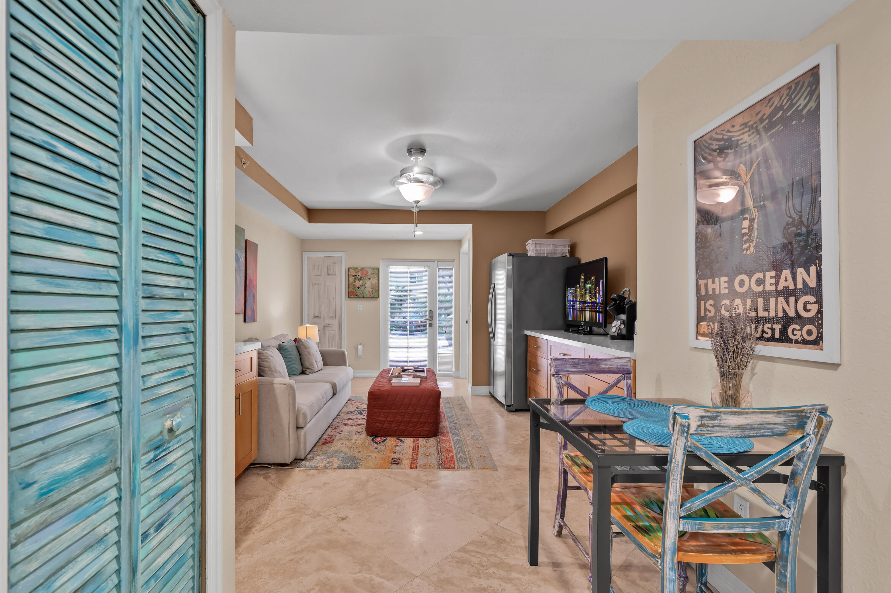 97501 Overseas Highway, Unit 607 Key Largo, FL 33037 - Photo 25 of 73 a living room with furniture and a window