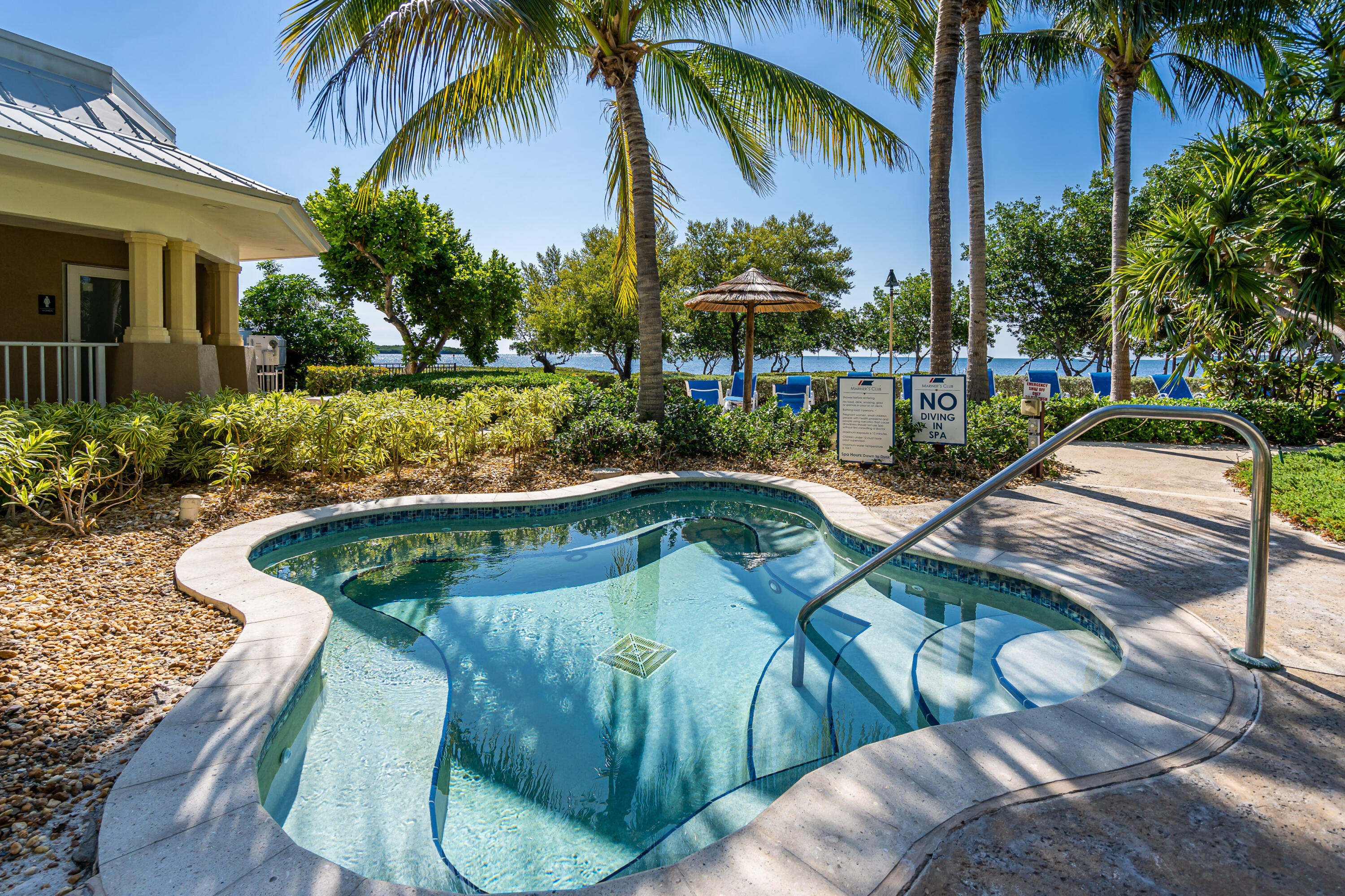 97501 Overseas Highway, Unit 607 Key Largo, FL 33037 - Photo 4 of 73 a view of a swimming pool with a patio