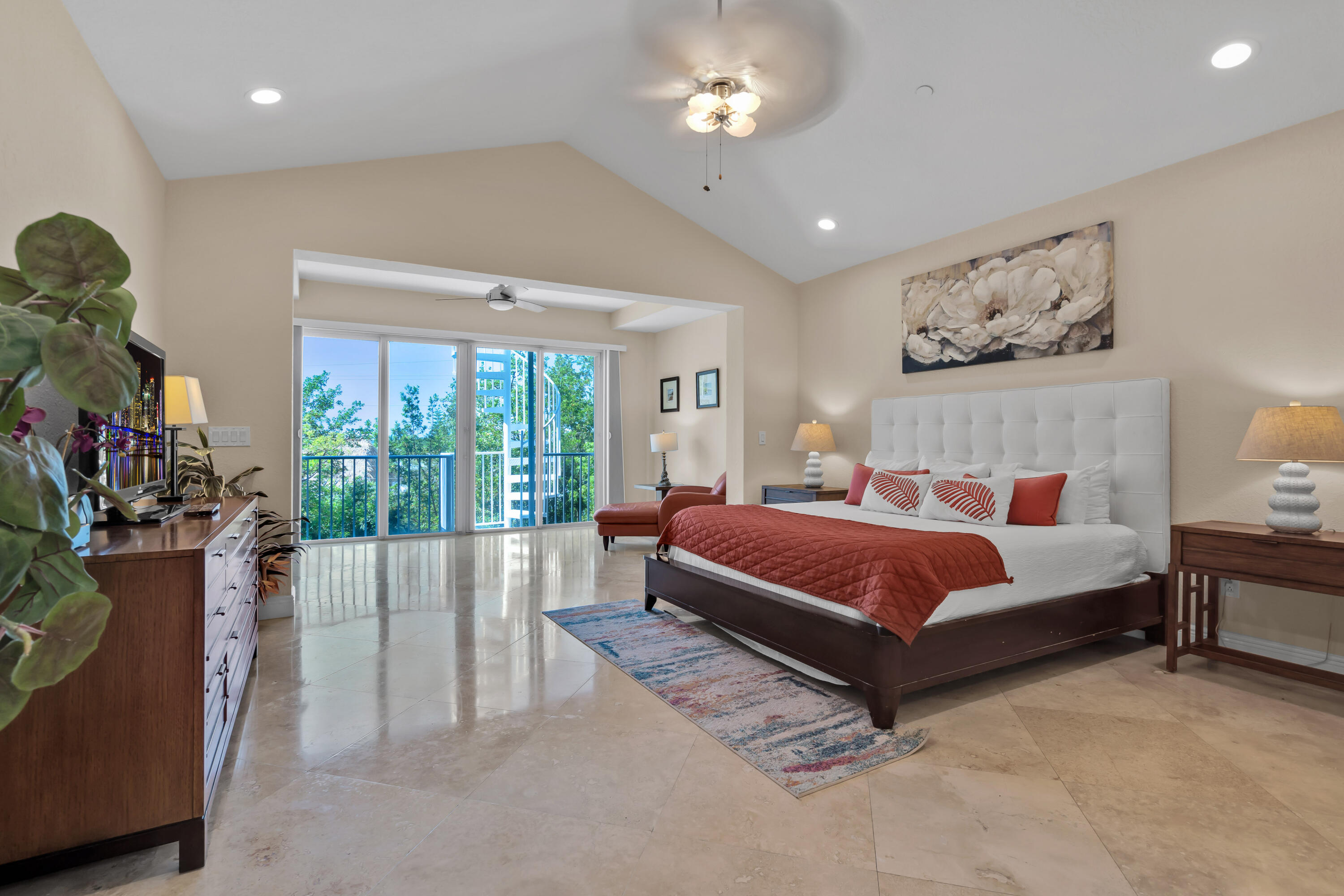97501 Overseas Highway, Unit 607 Key Largo, FL 33037 - Photo 43 of 73 a spacious bedroom with a bed and a large window