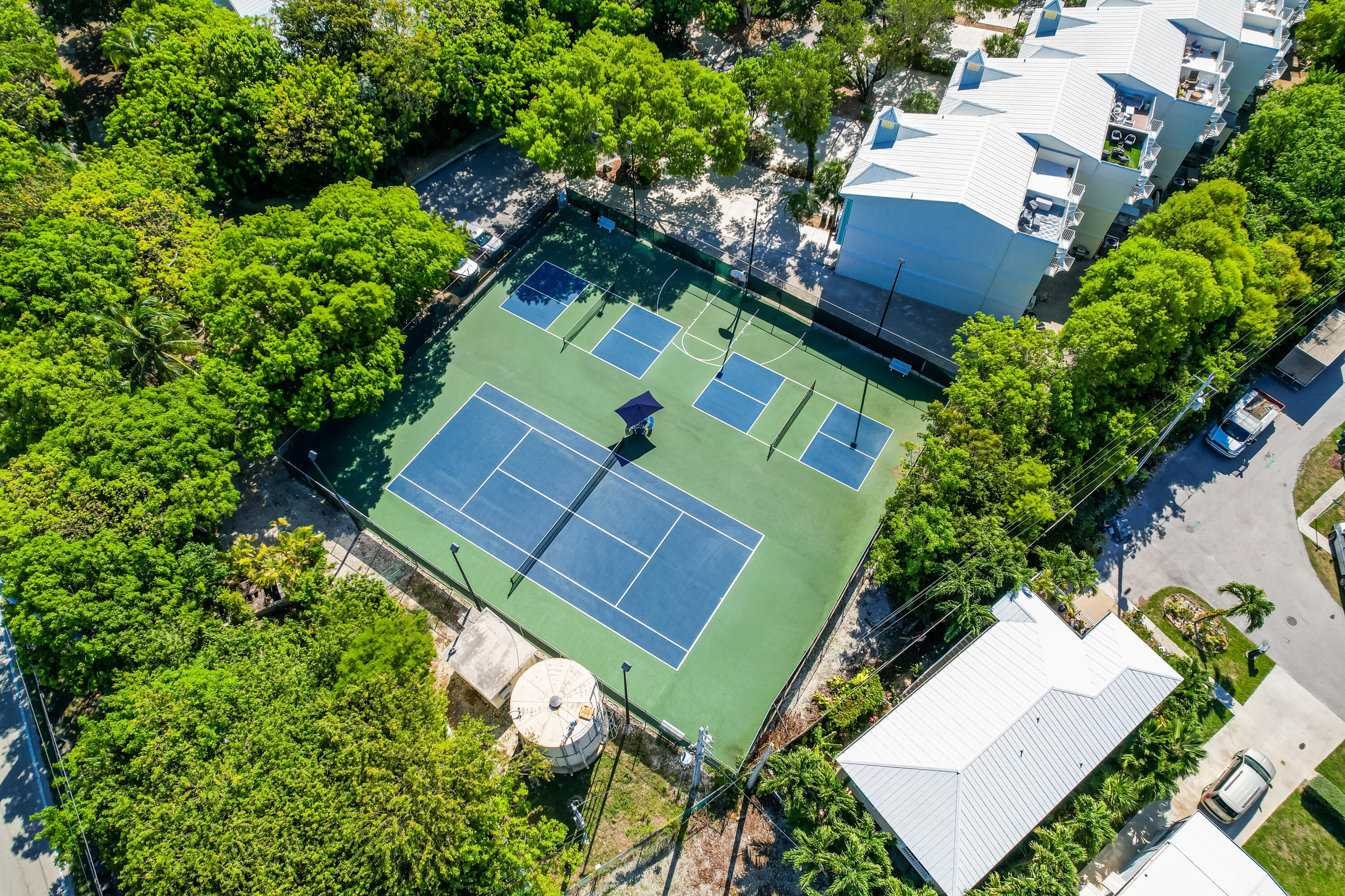 97501 Overseas Highway, Unit 607 Key Largo, FL 33037 - Photo 57 of 73 an aerial view of a house with a garden