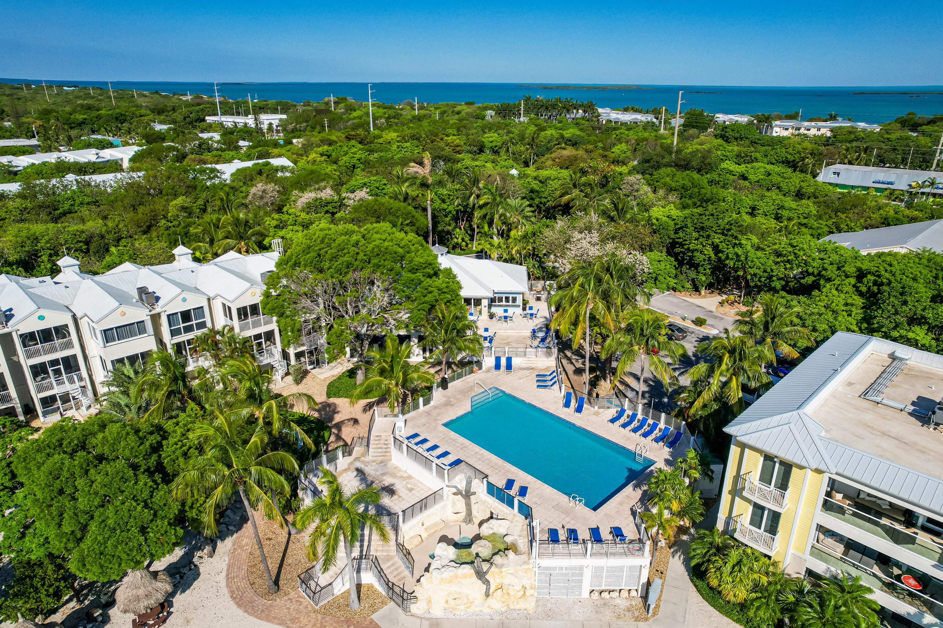 97501 Overseas Highway, Unit 607 Key Largo, FL 33037 - Photo 61 of 73 an aerial view of residential houses with outdoor space and street view