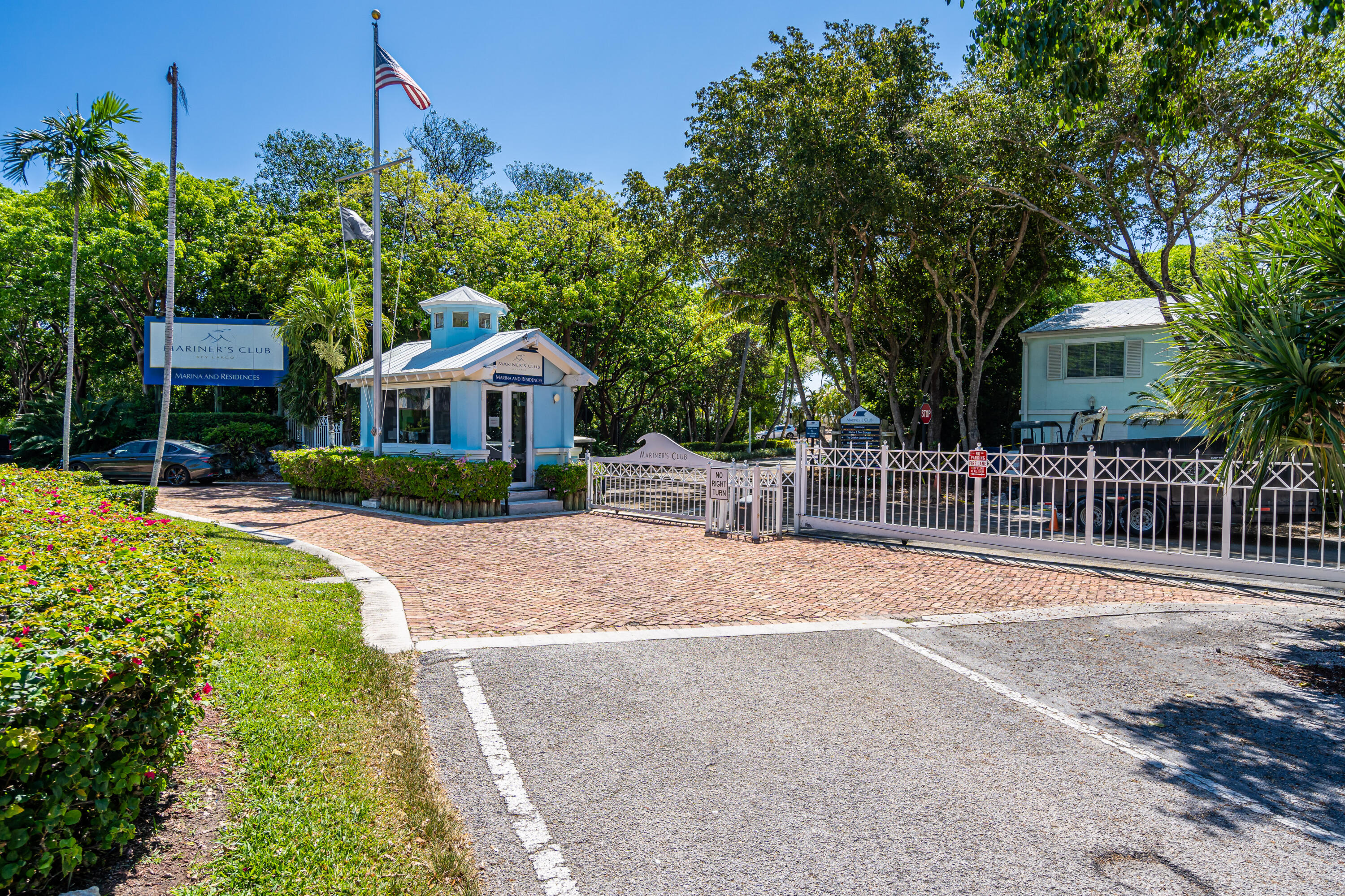 97501 Overseas Highway, Unit 607 Key Largo, FL 33037 - Photo 73 of 73 a front view of a house with a yard