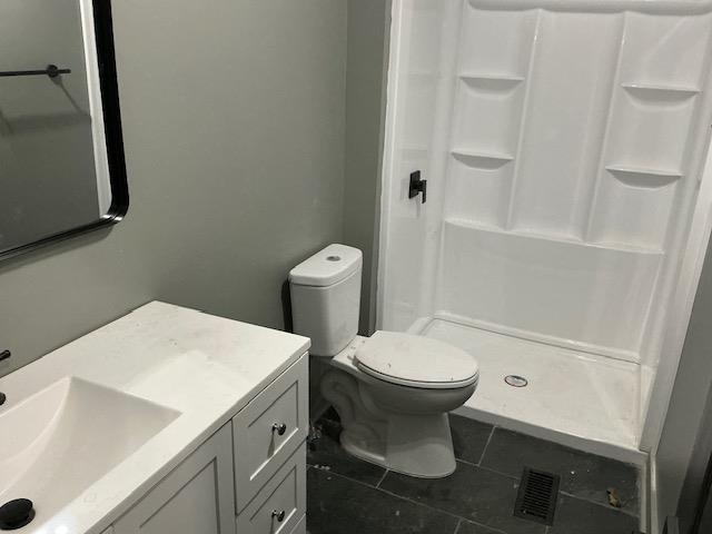 145 Walnut Bend Road Arlington, TN 38002 - Photo 6 of 9 a bathroom with a sink a toilet and shower