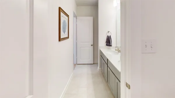 a bathroom with a toilet and a sink