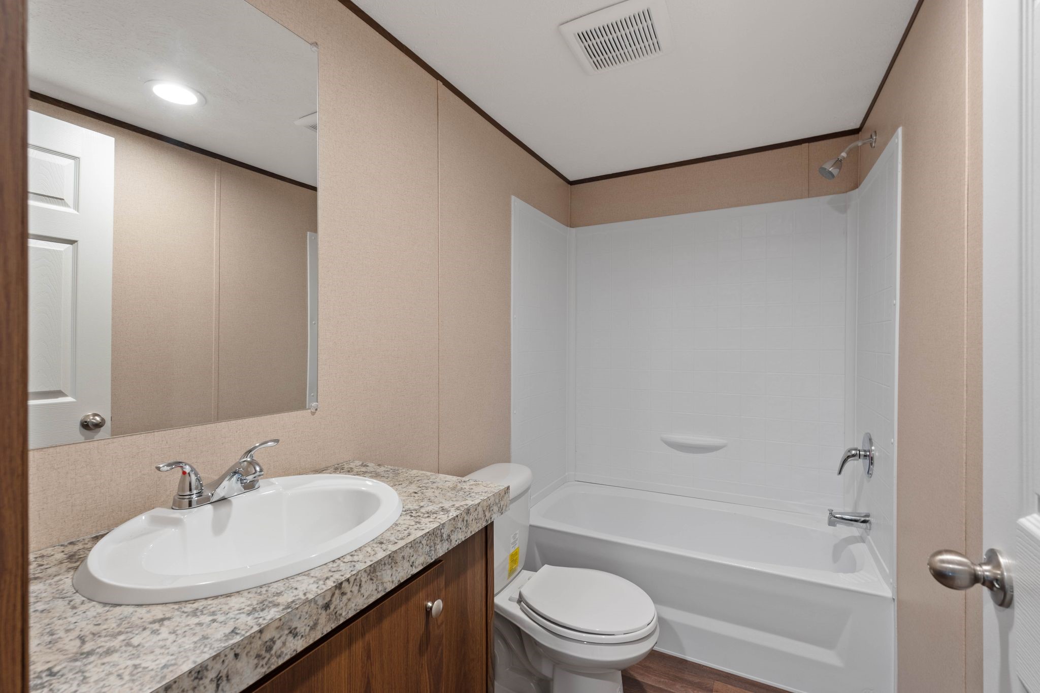 3941 Highline Oaks West Conroe, TX 77306 - Photo 25 of 38 a bathroom with a granite countertop sink toilet and shower