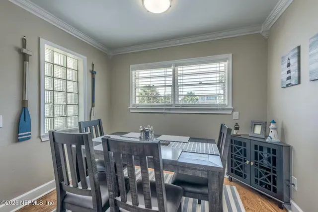 a kitchen with a stove a sink and a microwave