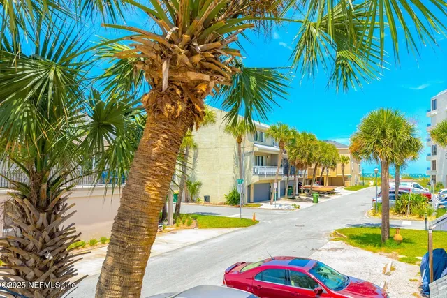 a view of balcony with yard