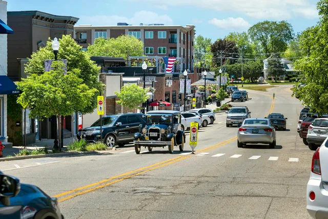 a view of a street with cars