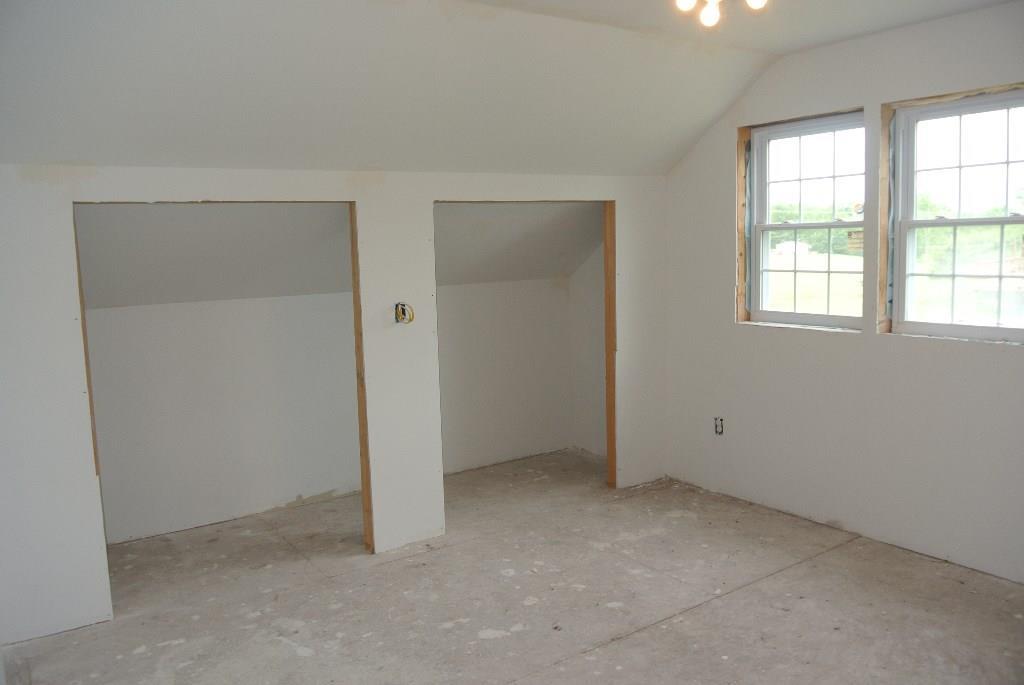 527 Wingood Road Windsor, ME 04363 - Photo 29 of 33 1 of the 2 bedrooms unfinished above...