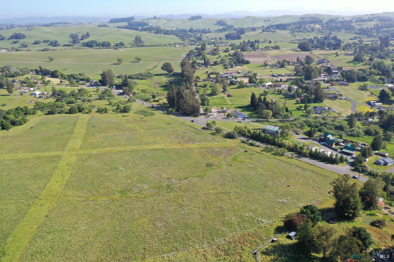 5301 Gravenstein Highway South Sebastopol, CA 95472 - Photo 2 of 3 an aerial view of a houses with a lake view