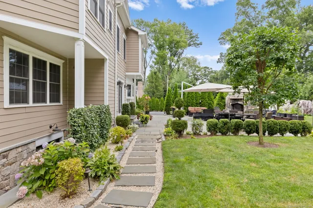 a view of a house with a garden