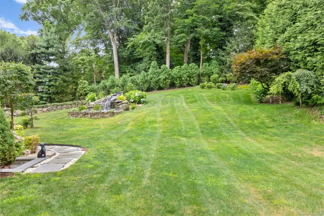 a view of a garden with a fountain