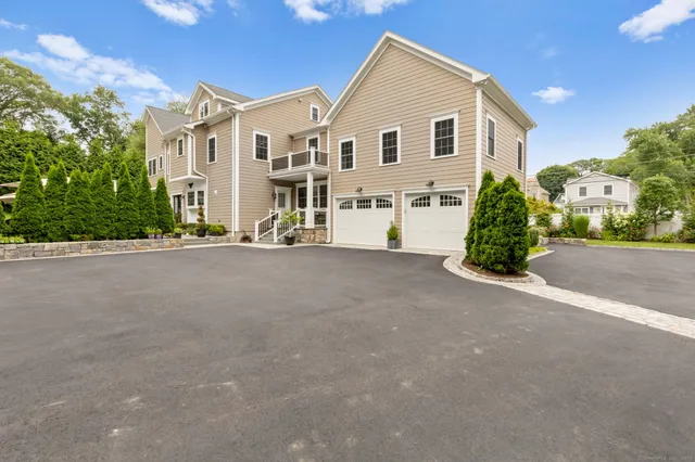 a view of a house with a street