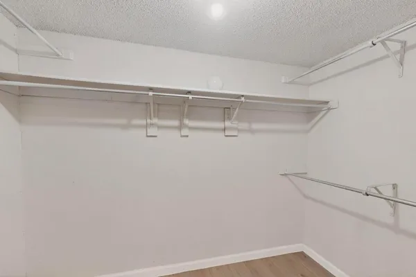 a view of a room with racks on the wall