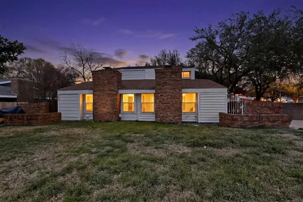 a view of backyard of house