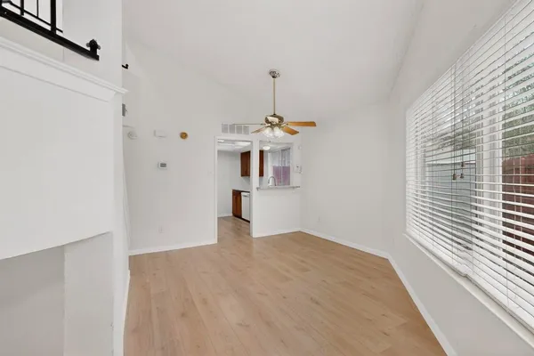 a view of a kitchen with a sink and dishwasher