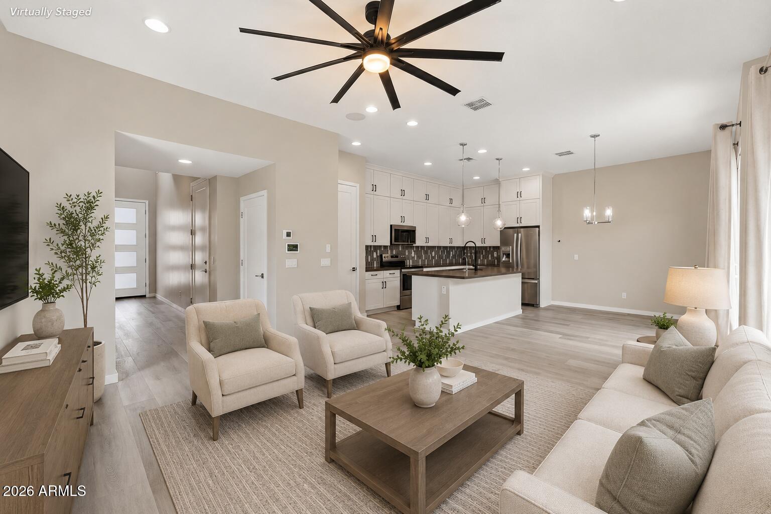 901 South Smith Road, Unit 1038 Tempe, AZ 85281 - Photo 7 of 29 a living room with furniture and kitchen view
