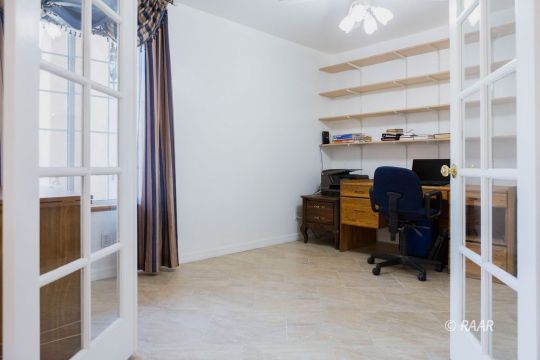 1248 Arroyo Street Ridgecrest, CA 93555 - Photo 16 of 34 a view of walk in closet with clothes and shoes