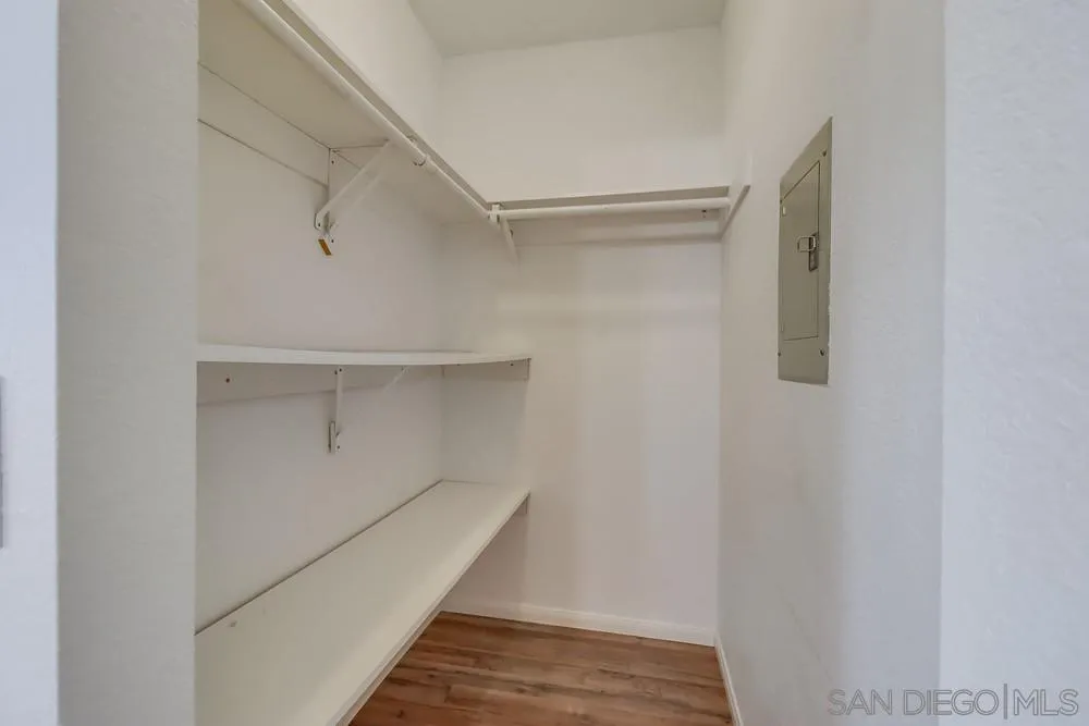 2157 Arnold Way, Unit 201 Alpine, CA 91901 - Photo 22 of 41 a view of walk in closet with empty racks