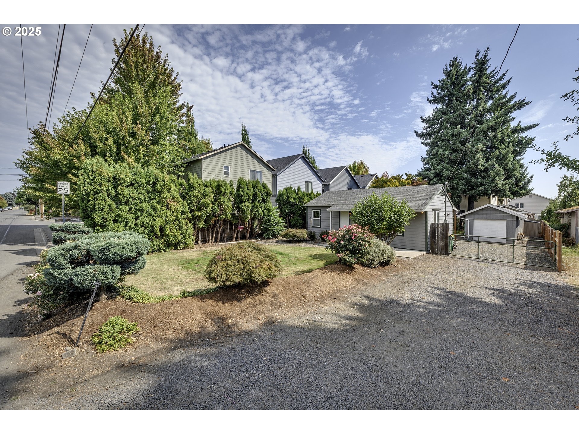 2319 Hawthorne Street Forest Grove, OR 97116 - Photo 2 of 33 a view of a barn with a yard plants and large tree