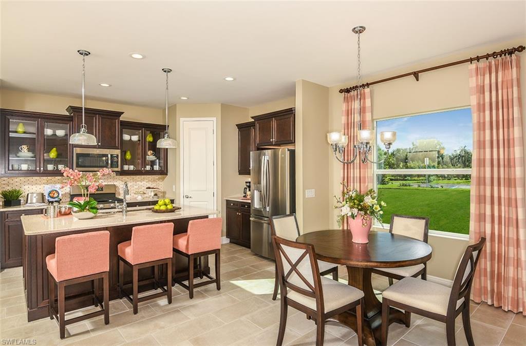 4048 Pegasus Way Naples, FL 34120 - Photo 4 of 13 a dining room with furniture and window