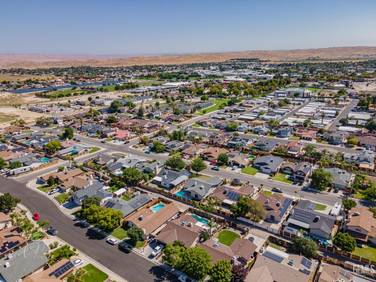 Undisclosed Address Taft, CA 93268 - Photo 31 of 32 an aerial view of a city with lots of residential buildings