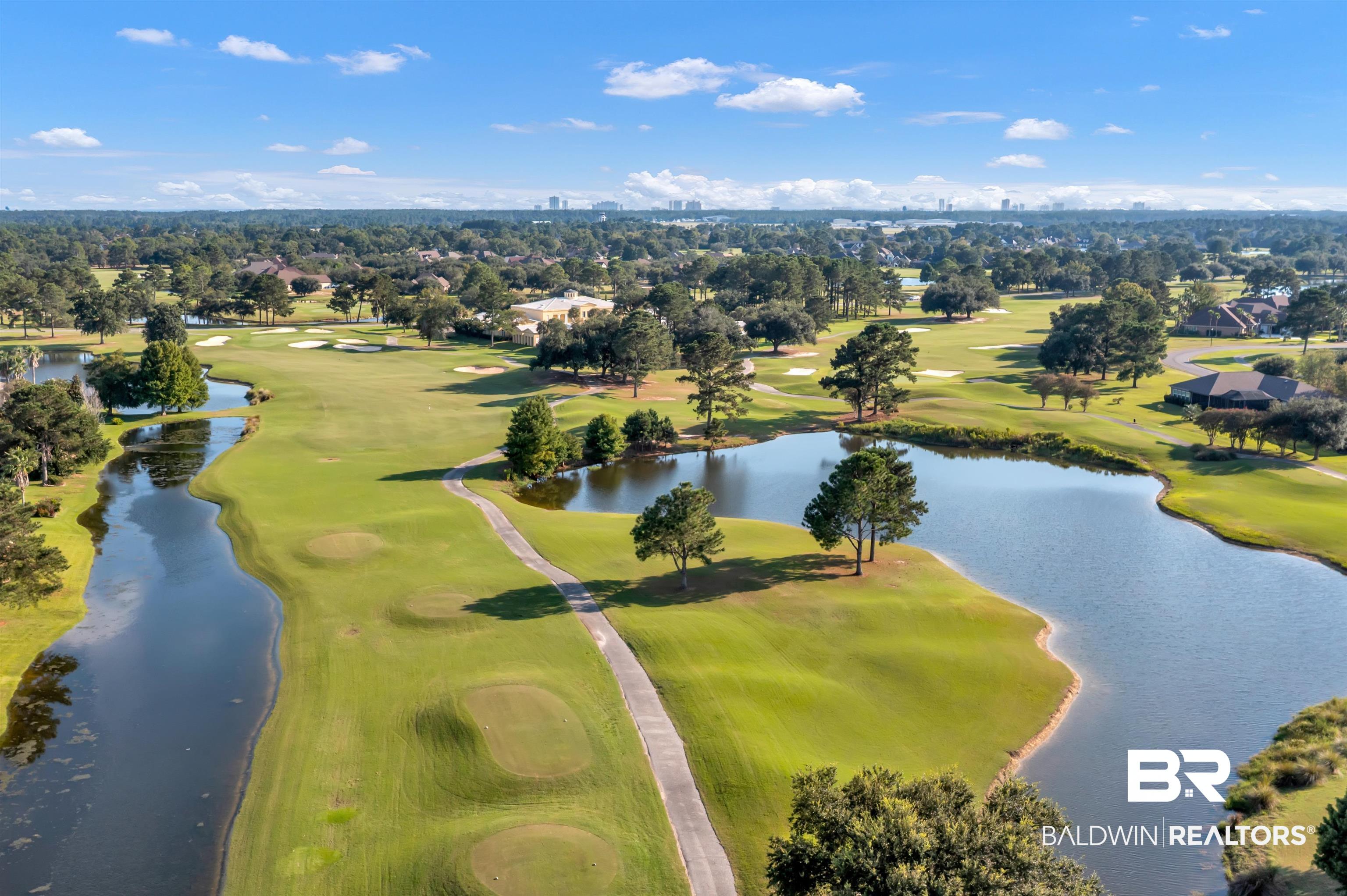 Lakes Circle Gulf Shores, AL 36542 - Photo 7 of 15 Drone / aerial view of a local golf course