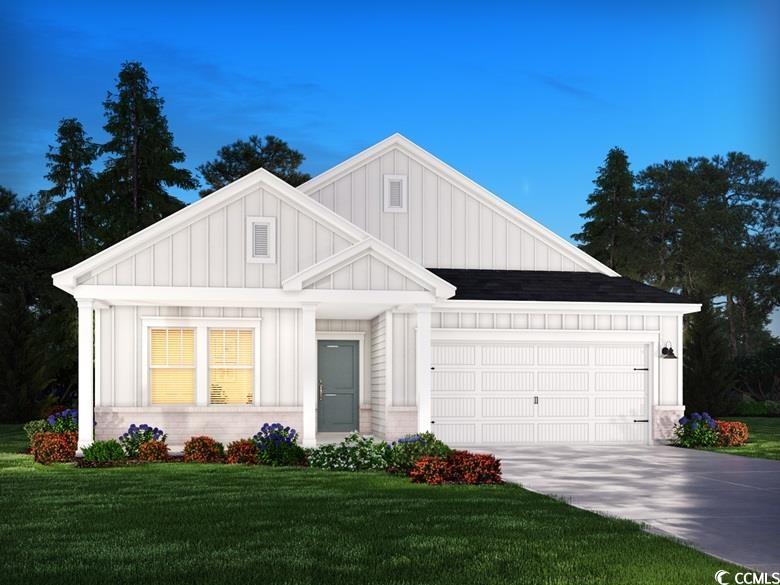 2126 Copper Crk Loop Longs, SC 29568 - Photo 2 of 4 View of front facade with board and batten siding,