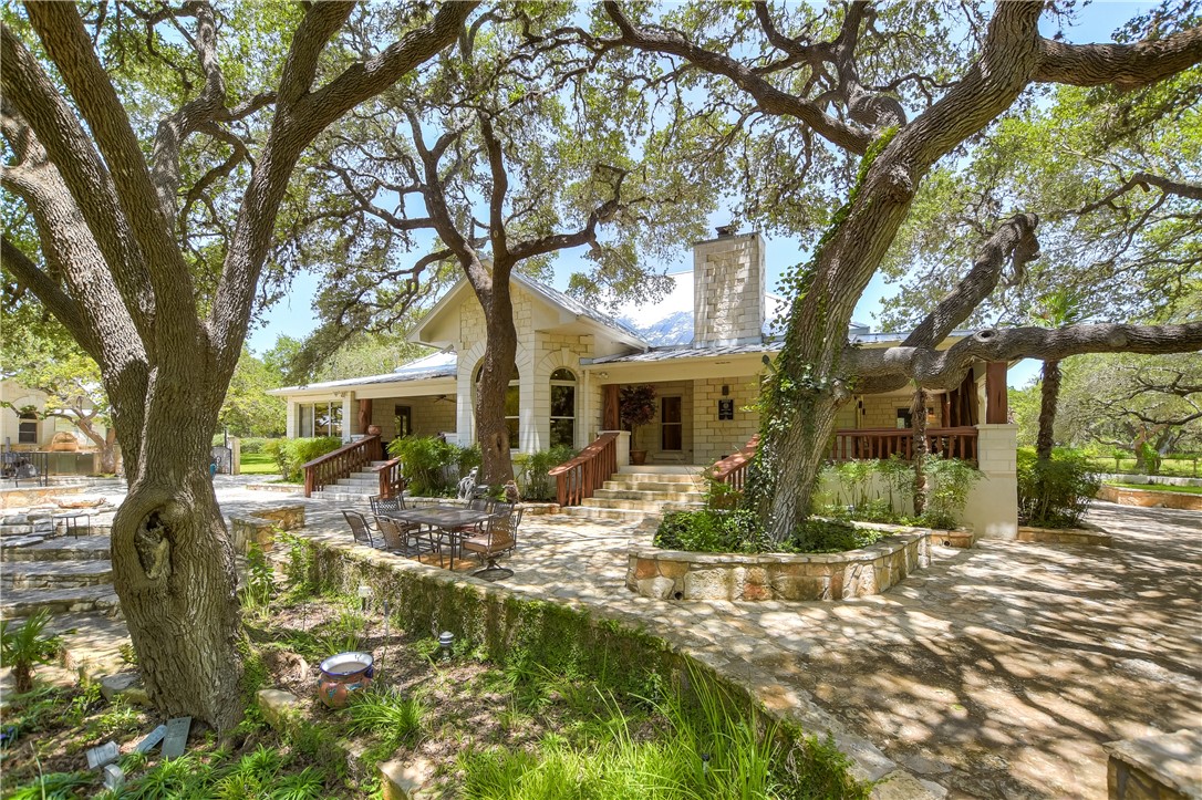 4270 Fischer Store Road Wimberley, TX 78676 - Photo 1 of 1 Front elevation with expansive patios