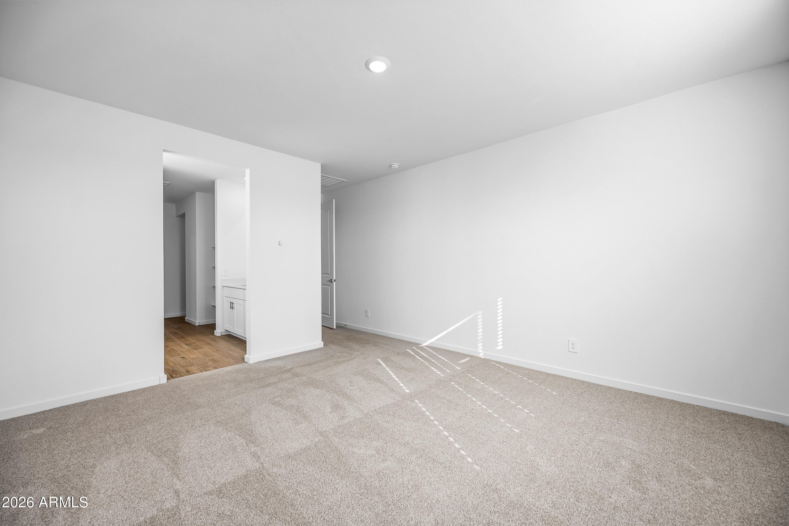 2563 Grenache Road San Tan Valley, AZ 85143 - Photo 13 of 25 a view of an empty room and closet area