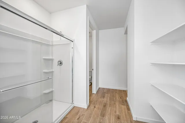 a view of a room with racks on the wall