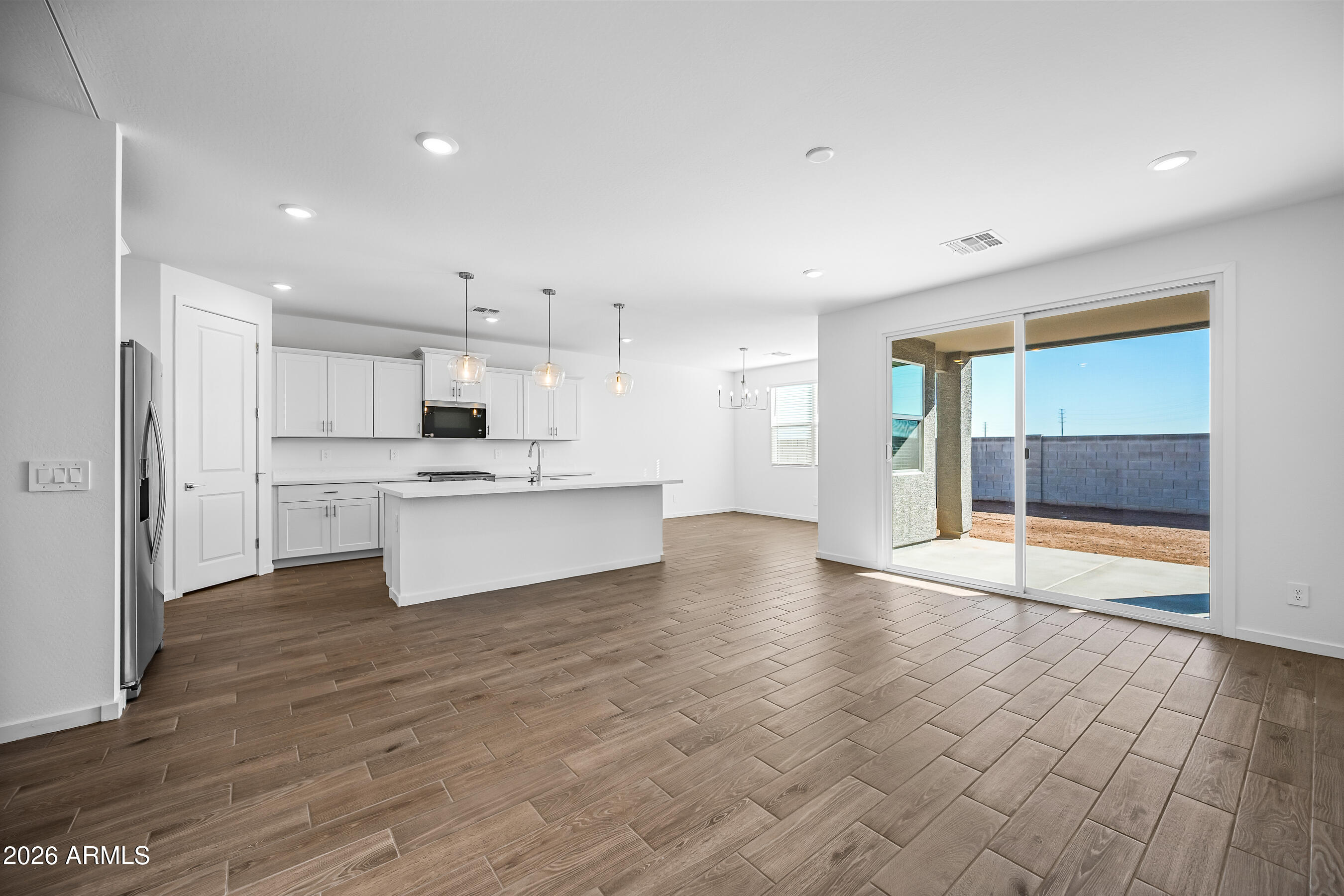 2563 Grenache Road San Tan Valley, AZ 85143 - Photo 4 of 25 a view of kitchen with wooden floor