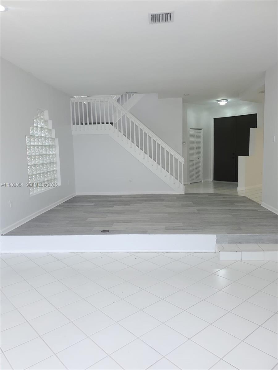 14765 Southwest 132nd Place Miami, FL 33186 - Photo 13 of 52 a view of an empty space with windows