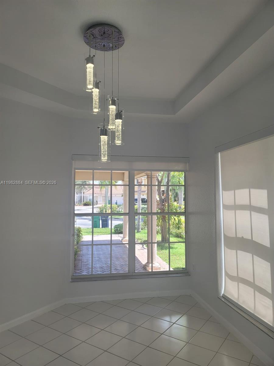 14765 Southwest 132nd Place Miami, FL 33186 - Photo 32 of 52 a view of an empty room with a window