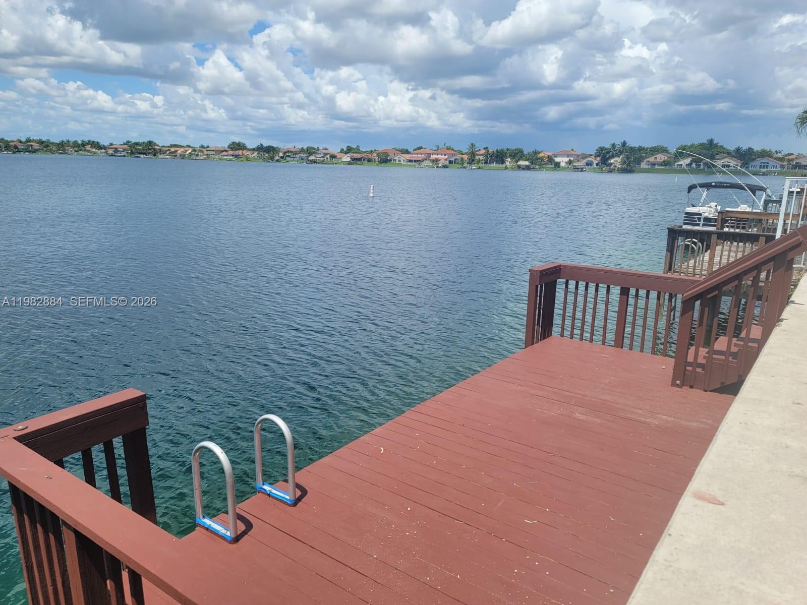 14765 Southwest 132nd Place Miami, FL 33186 - Photo 6 of 52 a view of a terrace with sitting area