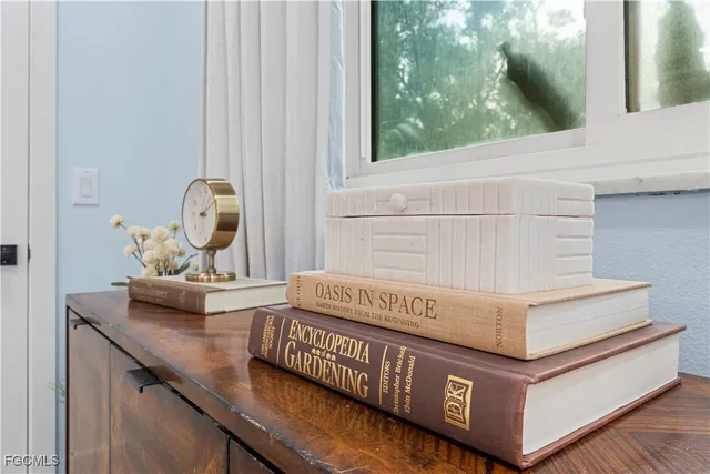 a view of living room with furniture and a window