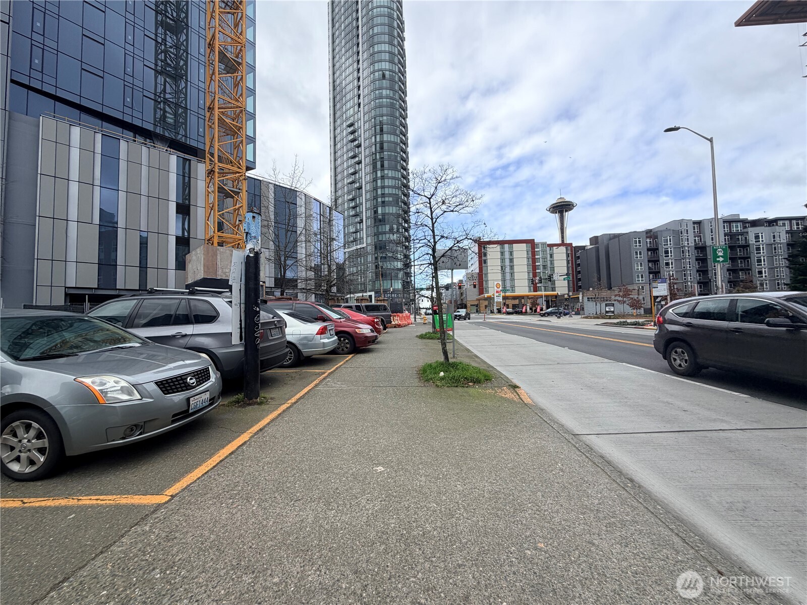 2404 7th Avenue Seattle, WA 98121 - Photo 2 of 13 a car parked on the side of a street