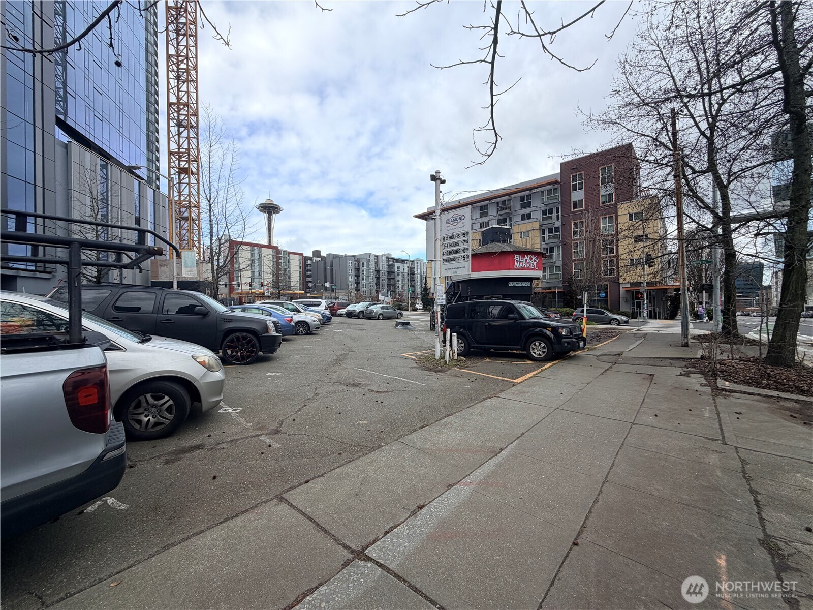 2404 7th Avenue Seattle, WA 98121 - Photo 7 of 13 a car parked in front of a building