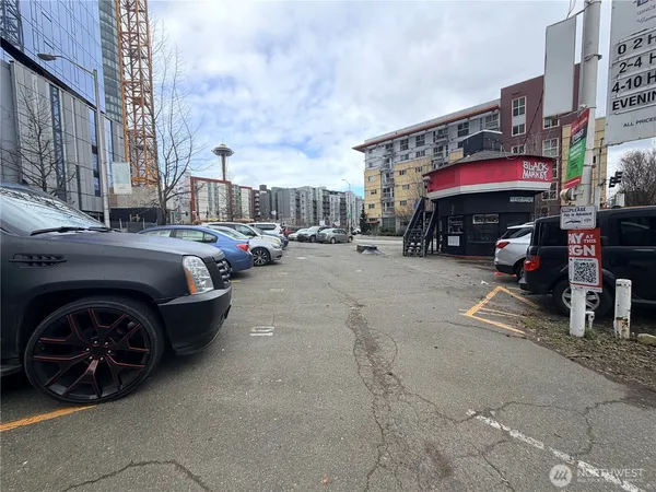 a view of a street with cars