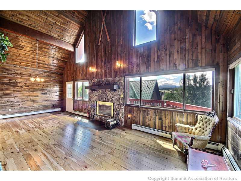 63 Idlewild Drive Summit Cove, CO 80435 - Photo 5 of 25 a view of a porch with wooden floor