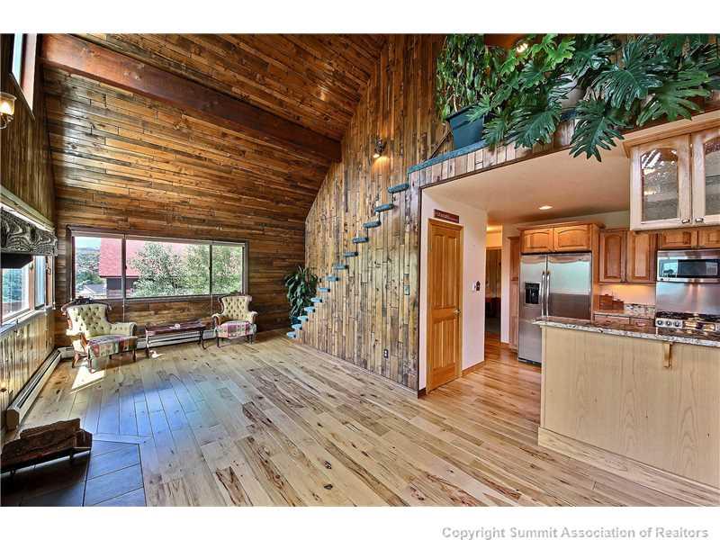 63 Idlewild Drive Summit Cove, CO 80435 - Photo 6 of 25 a view of a living room and a kitchen
