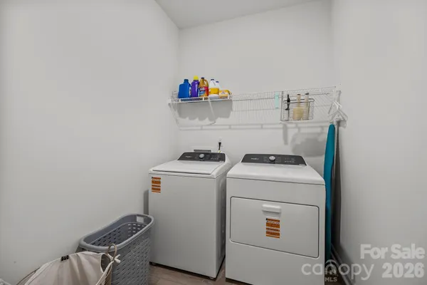 a bathroom with a sink a toilet a bathtub and shower