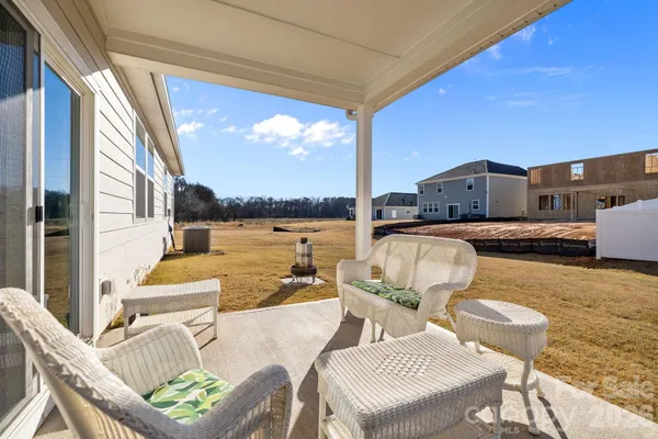 a front view of a house with a patio