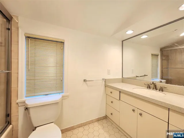 a view of a small space with racks on the wall