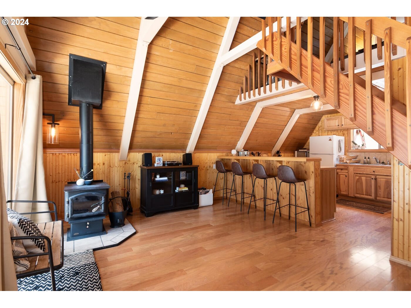 16942 Downey Road Bend, OR 97707 - Photo 11 of 22 a view of a living room and kitchen