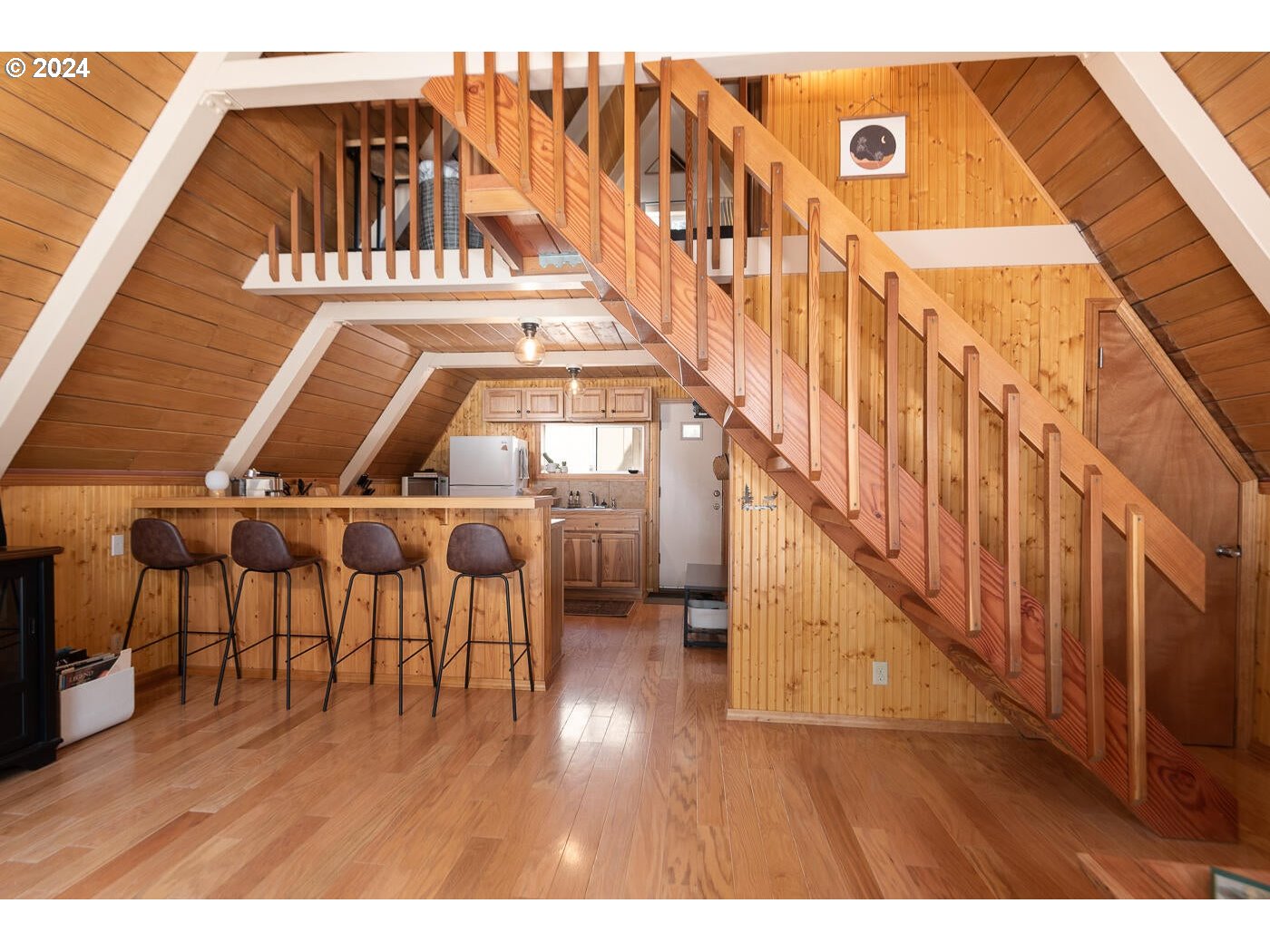 16942 Downey Road Bend, OR 97707 - Photo 12 of 22 a view of entryway and hall with wooden floor