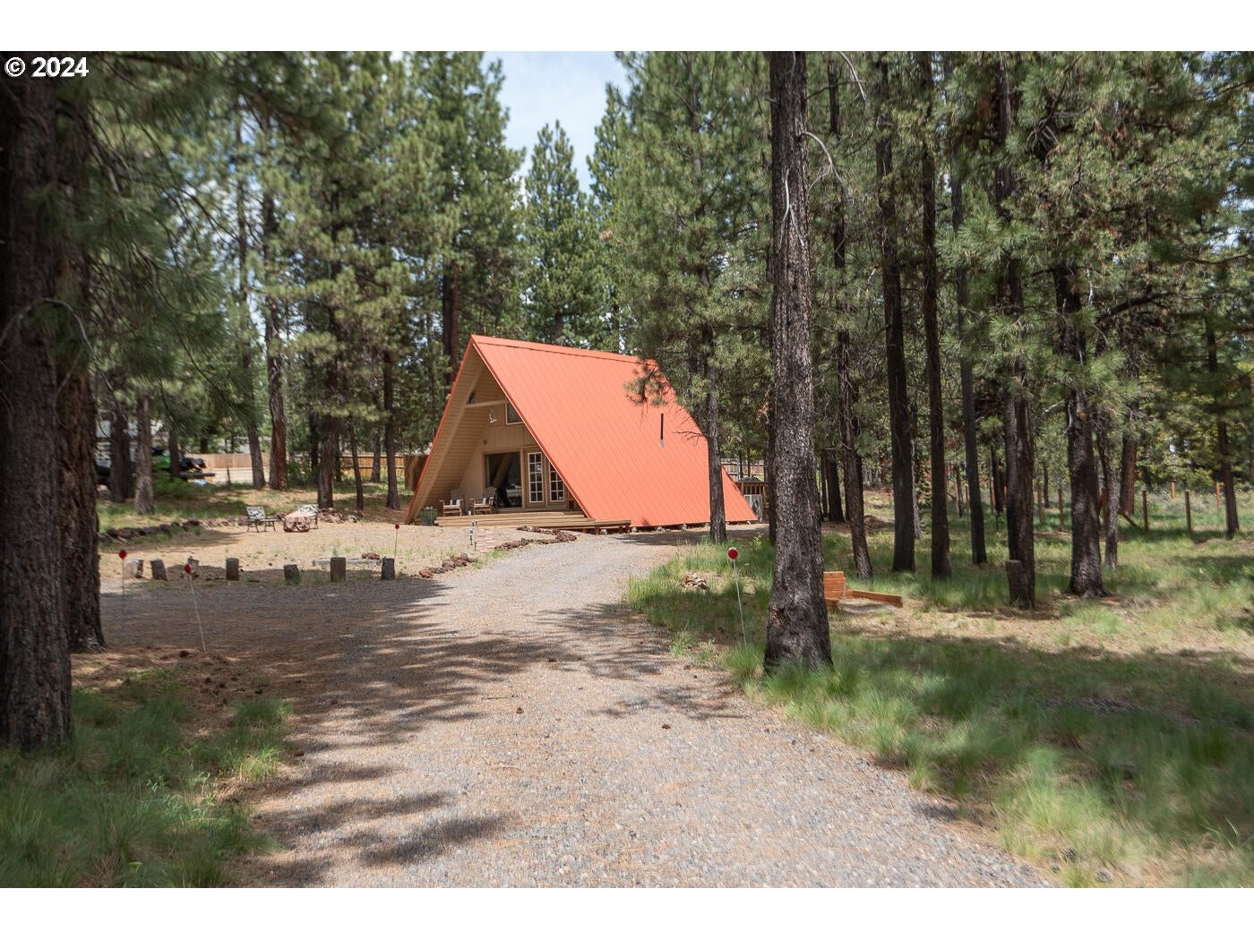 16942 Downey Road Bend, OR 97707 - Photo 2 of 22 a view of a park with large trees