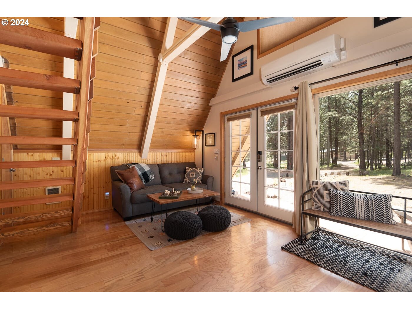 16942 Downey Road Bend, OR 97707 - Photo 10 of 22 a living room with furniture and a large window