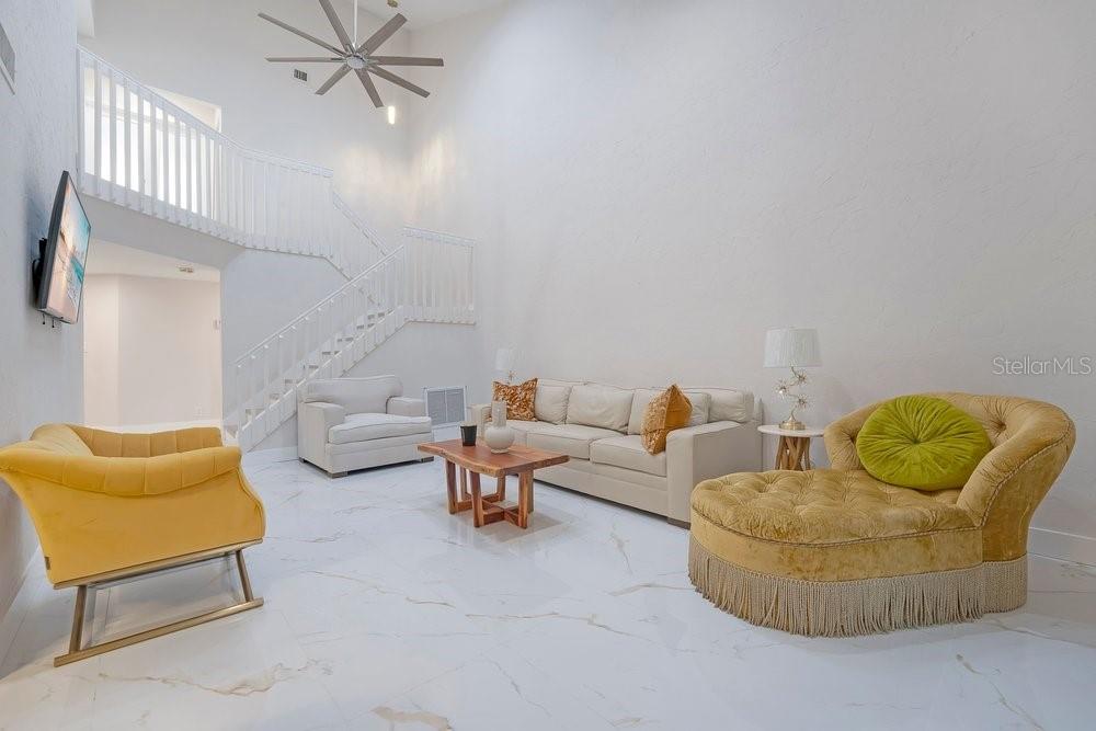 7838 La Mirada Drive Boca Raton, FL 33433 - Photo 19 of 43 a living room with furniture and a rug